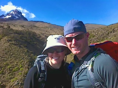 Tyler Howitt & Nicole Flewelling trekking Mount Kilimanjaro Tanzania Africa